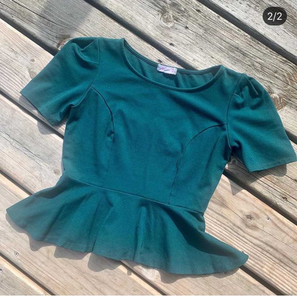 Emerald peplum top